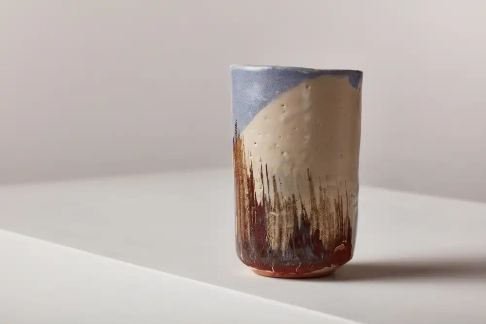 Glazed clay cup
