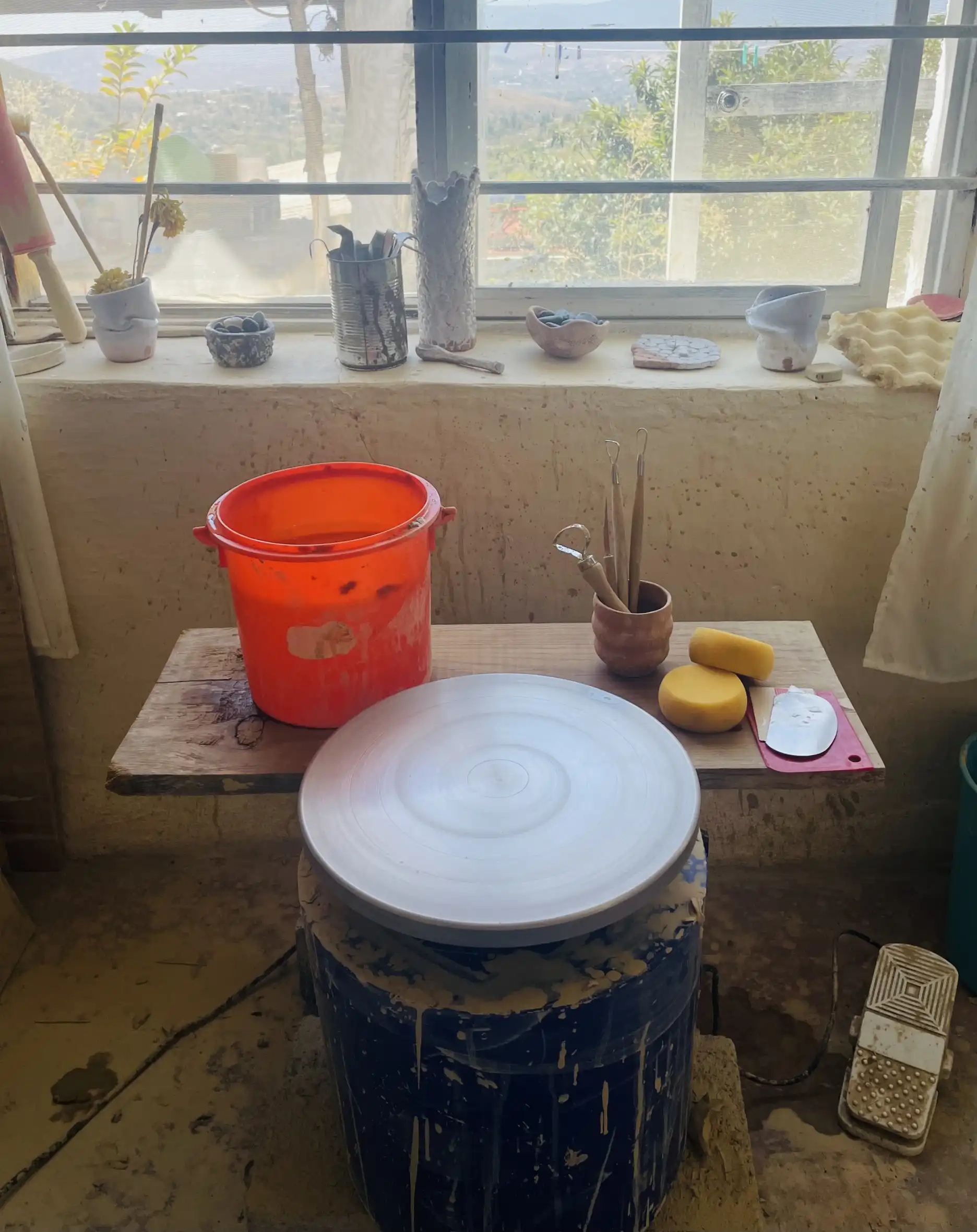 Photograph of a pottery wheel in the Paulina Rizzo pottery studio in Oaxaca